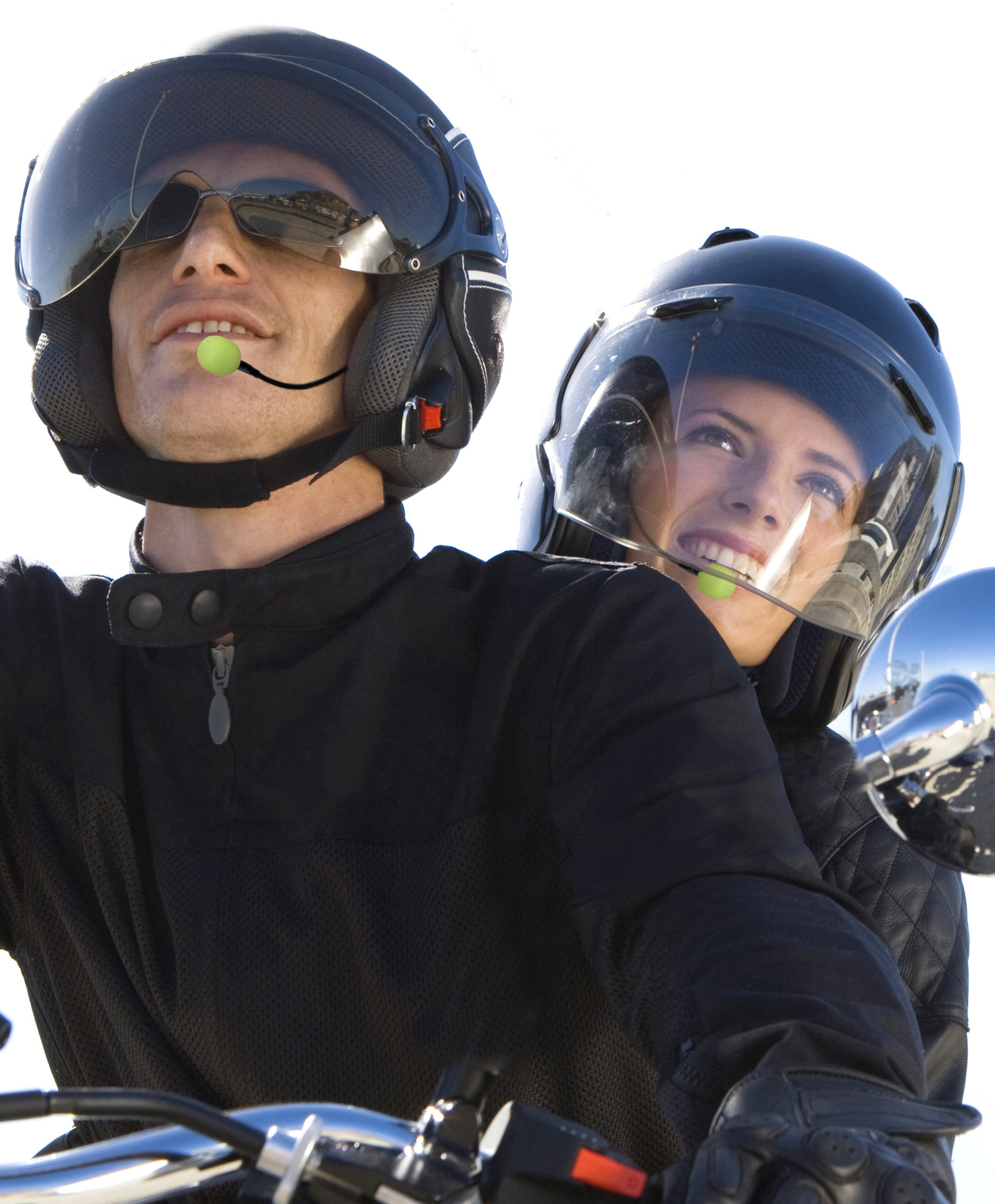 Couple riding motorcycle