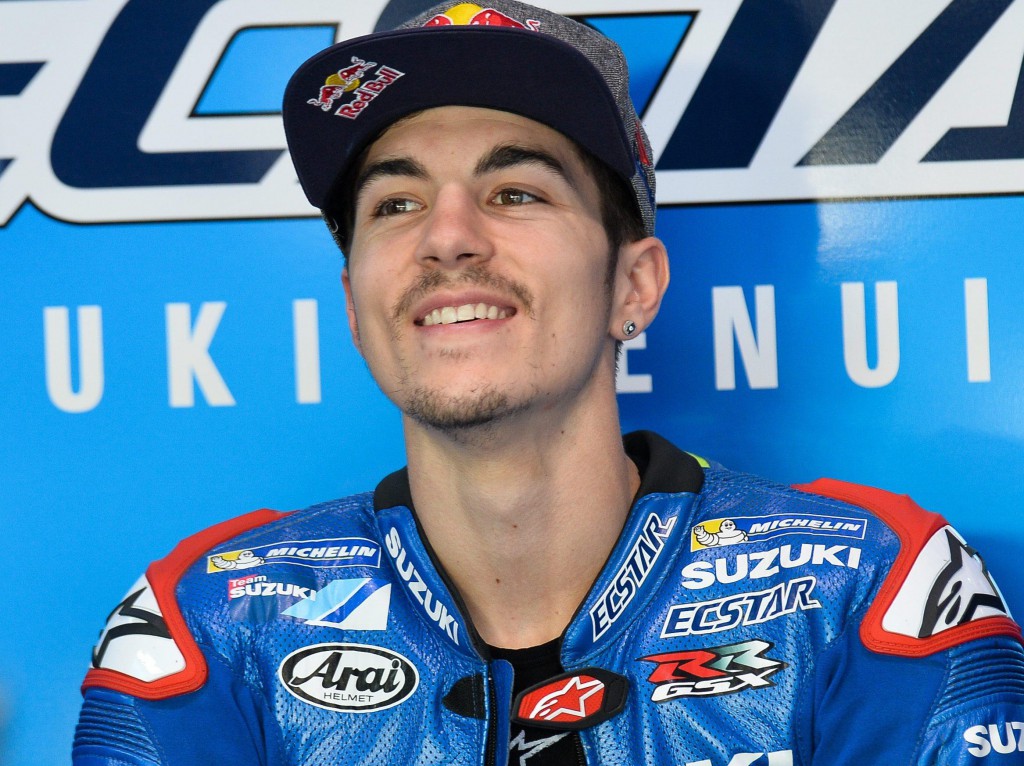epa05222618 Spanish MotoGP rider Maverick Vinales of the Team Suzuki Ecstar MotoGP  prepares for the warm up session prior to the Motorcycling Grand Prix of Qatar at the Losail International Circuit in Doha, Qatar, 20 March 2016.  EPA/STR